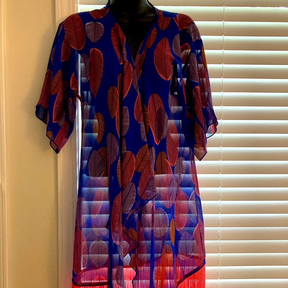 Bundle 3 $6 and under for $13. Beautiful Lularoe Kimono.NWOT